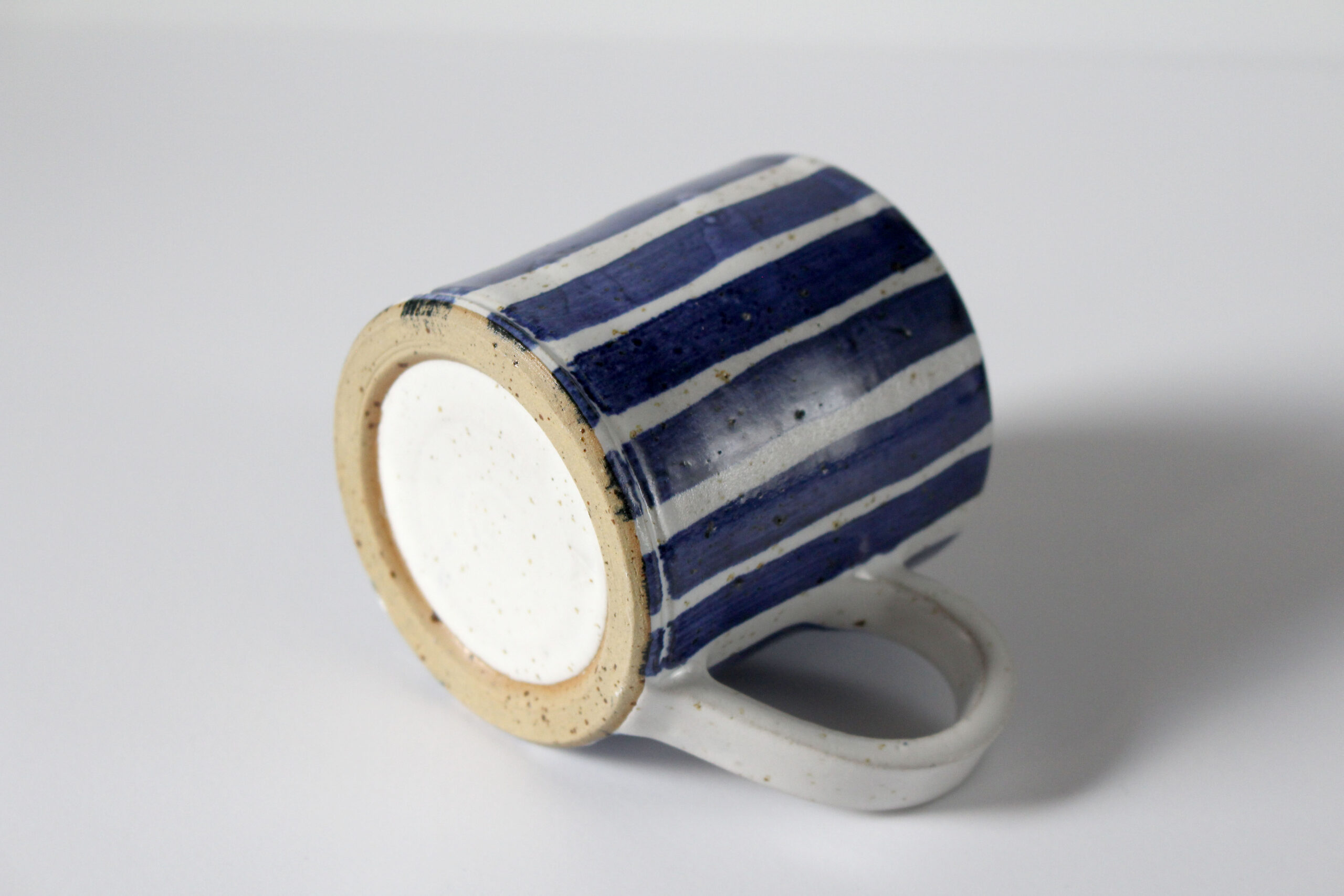stripy cup on the side